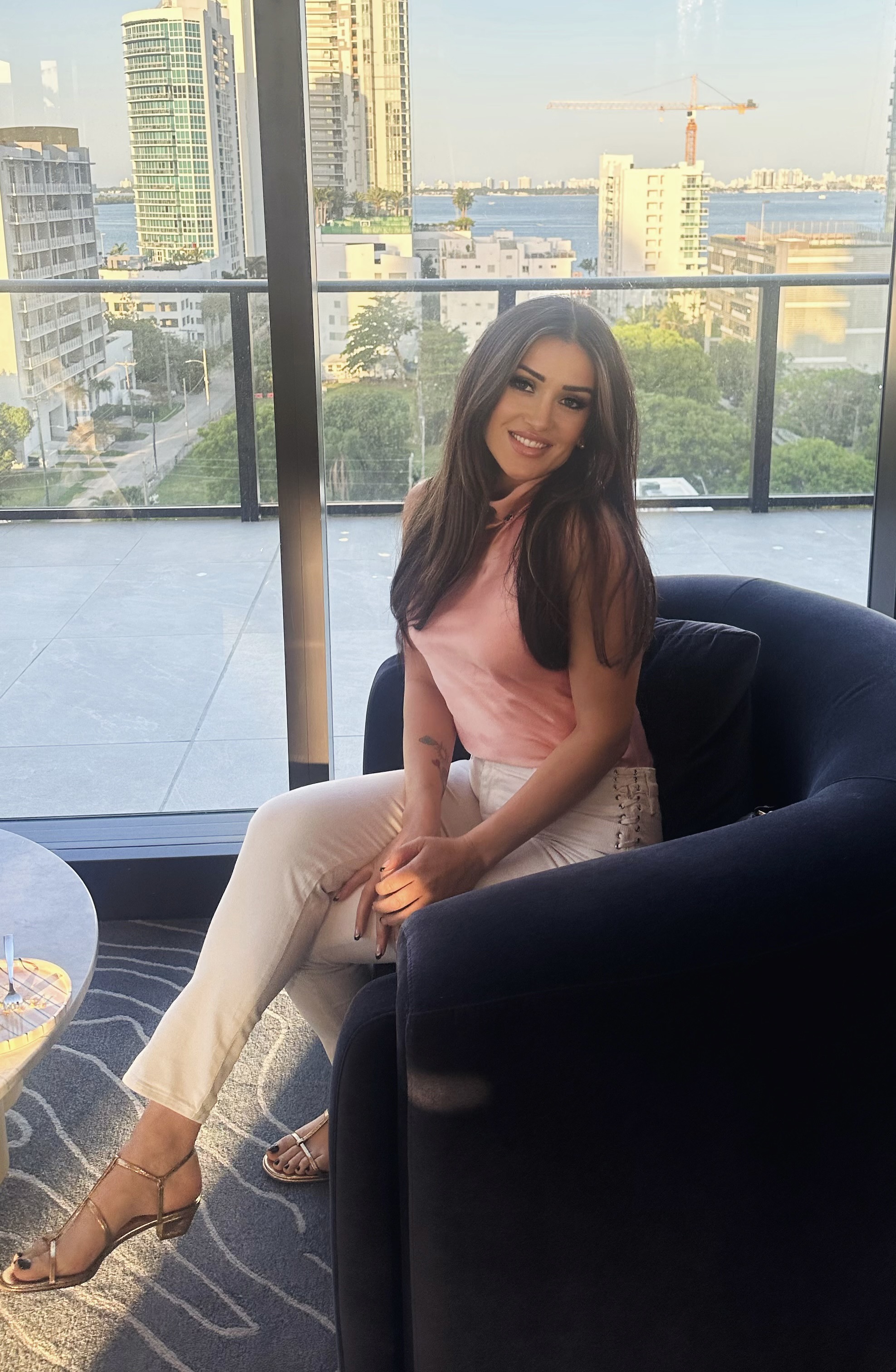 Elisa - Top-rated massage therapist in Miami with city view